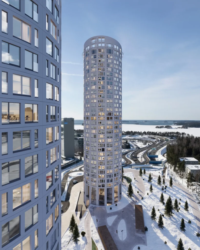 Aerial 3D rendering of a cylindrical residential tower on a snow-covered coastline, Finland