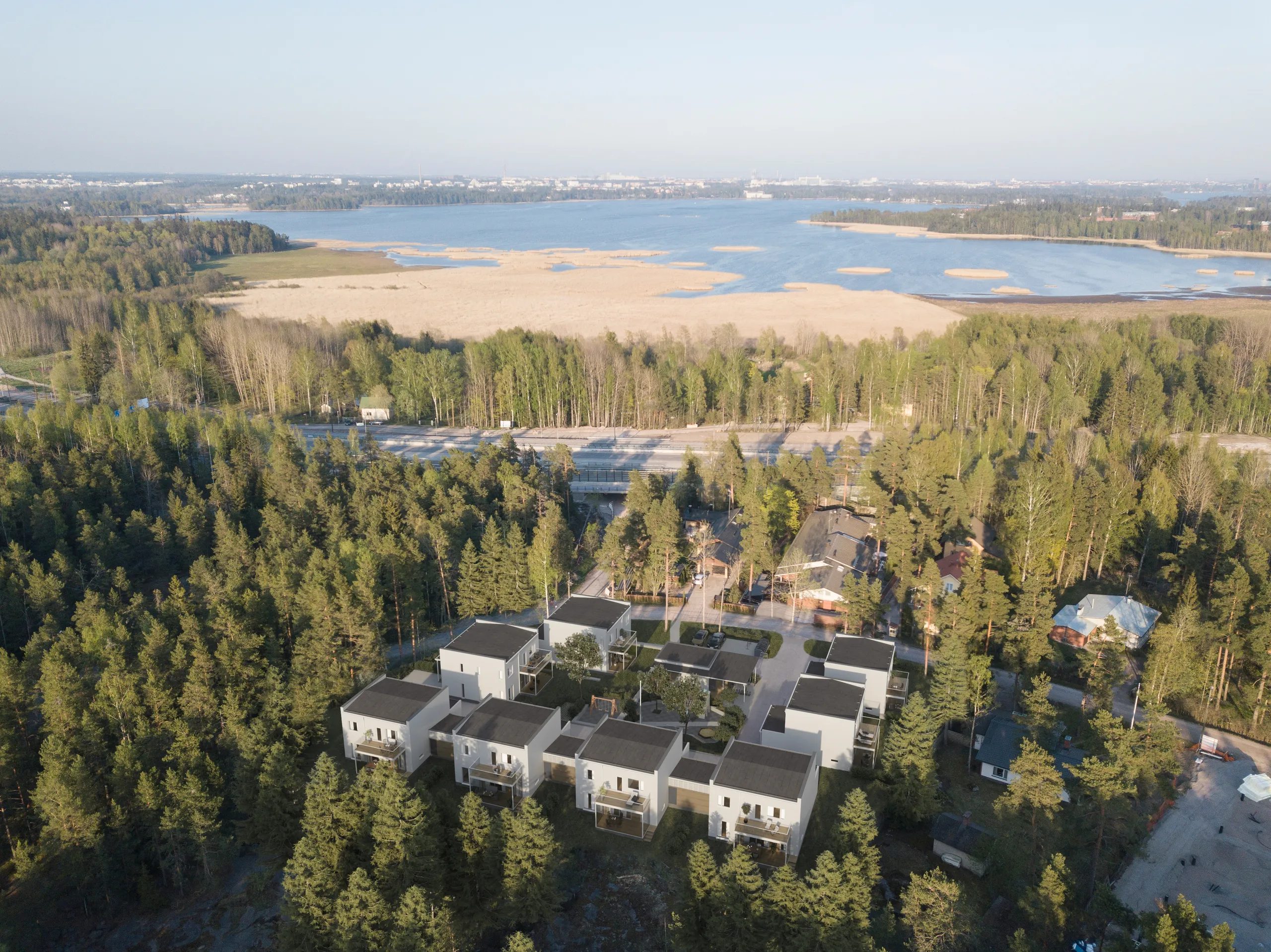 Aerial 3D rendering of houses in a forest beside a lake, Finland