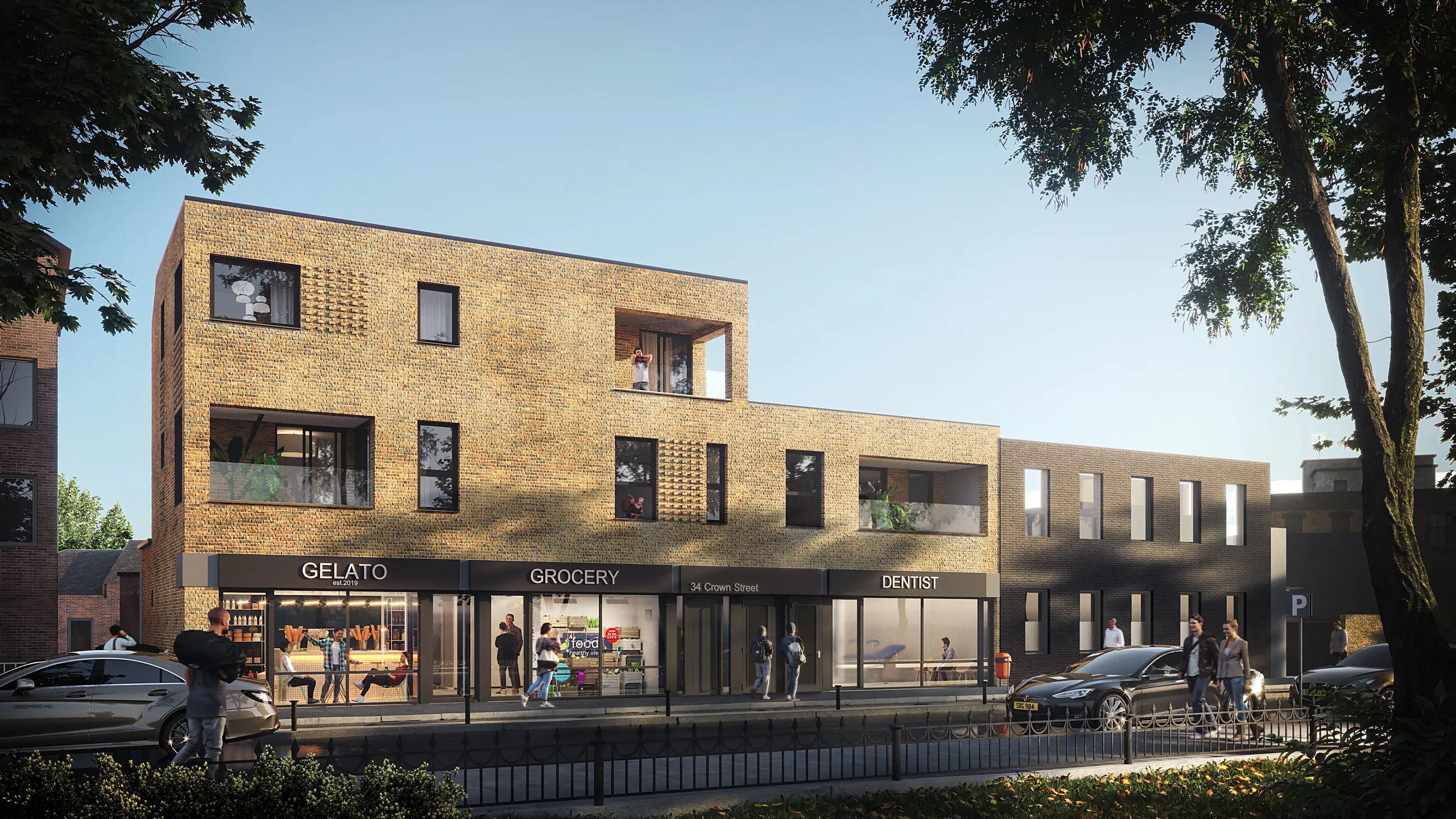 Brick mixed-use frontage with active shopfronts, the kind of image a letting pack leads on